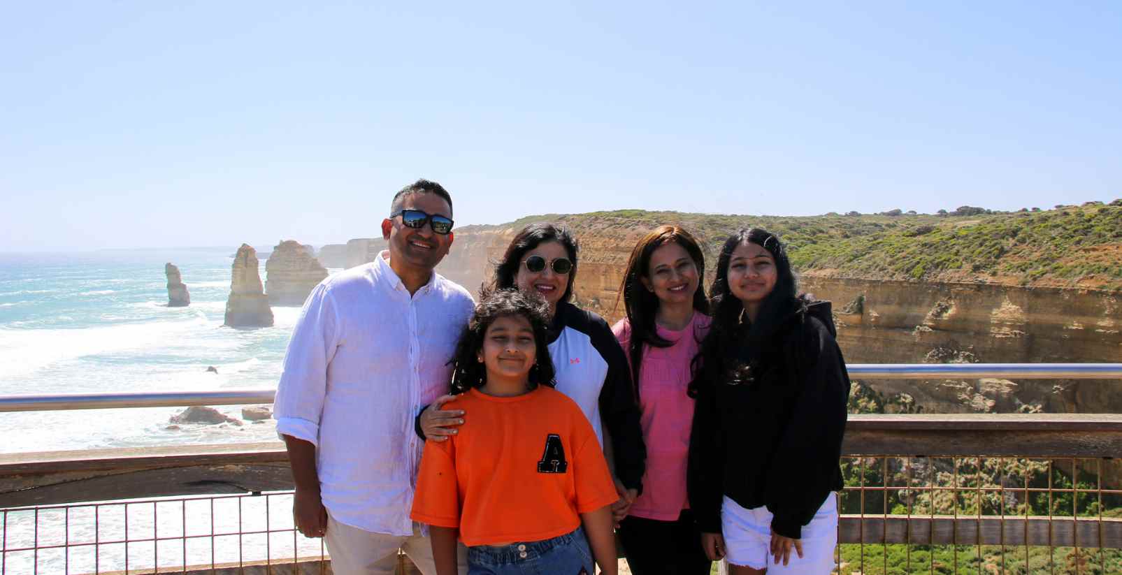Family standing infront of 12 Apostles