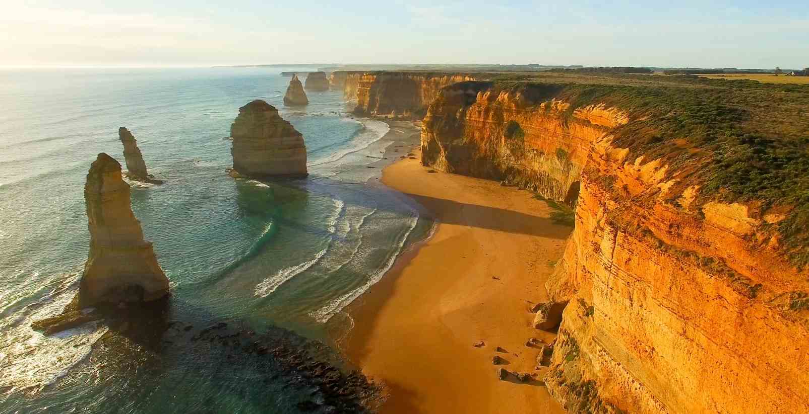sglowing sunset over twelve apostles from above